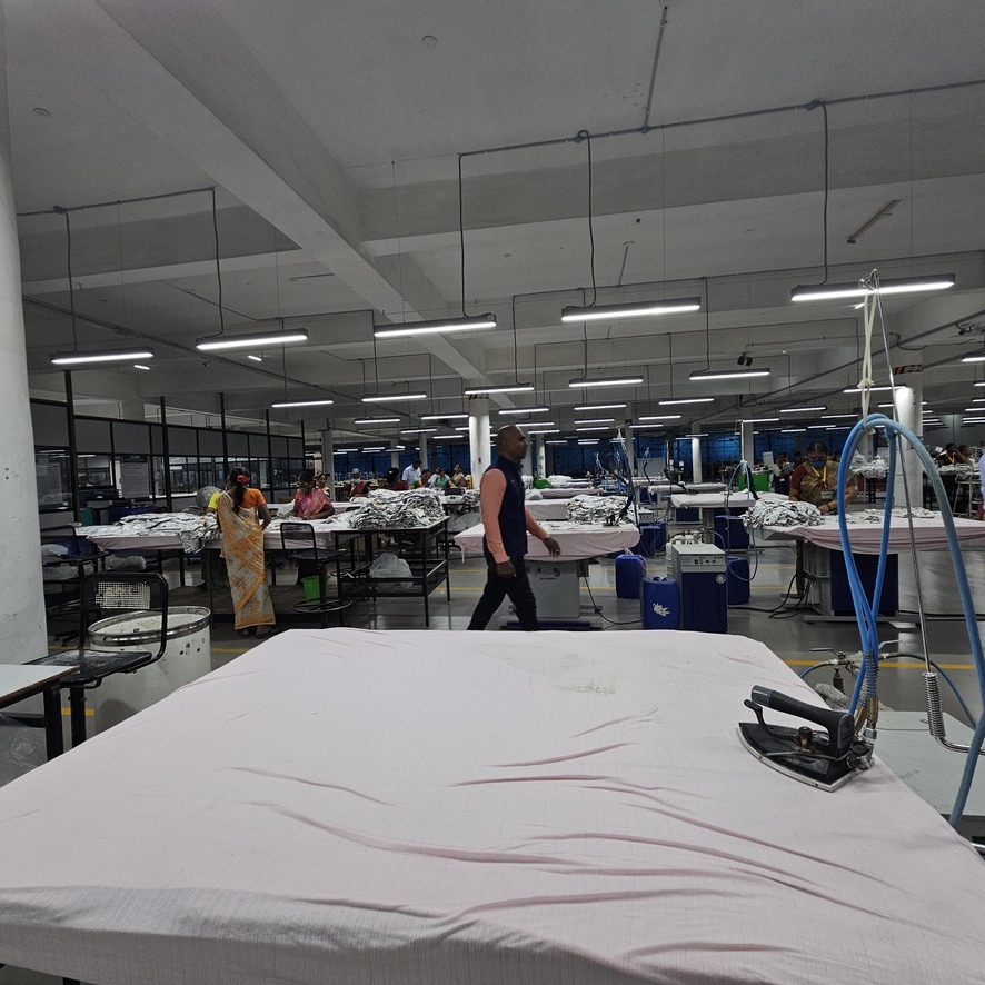 Fabric cutting and ironing station